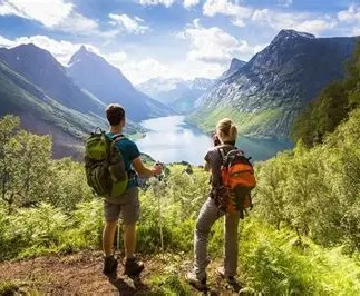Two adventurous people admiring beautiful scenery